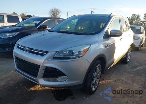 2014 Ford Escape Titanium z USA, uszkodzony, nr VIN 1FMCU9J9XEUC10703